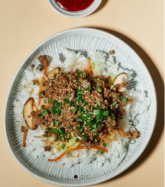Healthy Bulgogi Plant-Based Beef Mince Bowl with Sauteed Market Vegetables, Cucumber Kimchi, Gochujang Sauce Sesame Rice