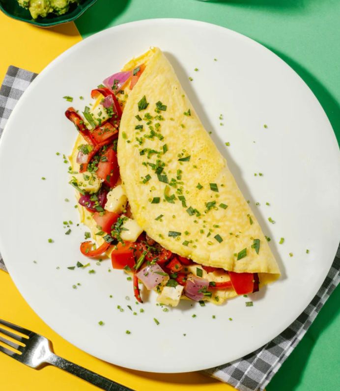 Cheese Omelette with Roasted Peppers, Tomato, Red Onion & Tarragon