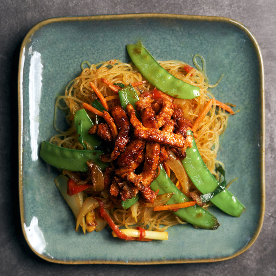 Singapore Style Curried Noodles with Char Siu Omni Pork Strips, Snow Peas, Red Peppers & Shredded Carrots