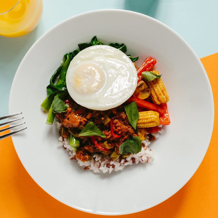 Stir Fried Omnipork with Thai Stir Fried Vegetables, Fried Egg & Brown Rice