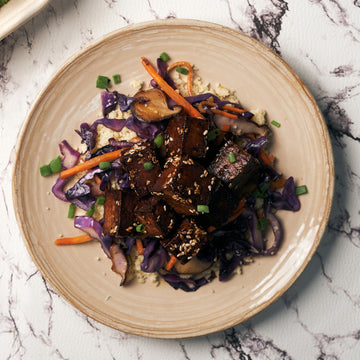 Sesame & Maple Glazed Tofu with Sauteed Red Cabbage, Mushrooms & Cous Cous