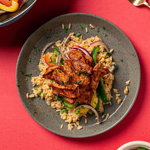 Chicken Fajita with Sauteed Peppers, Cherry Tomato & Onion and Spanish Rice Pilaf