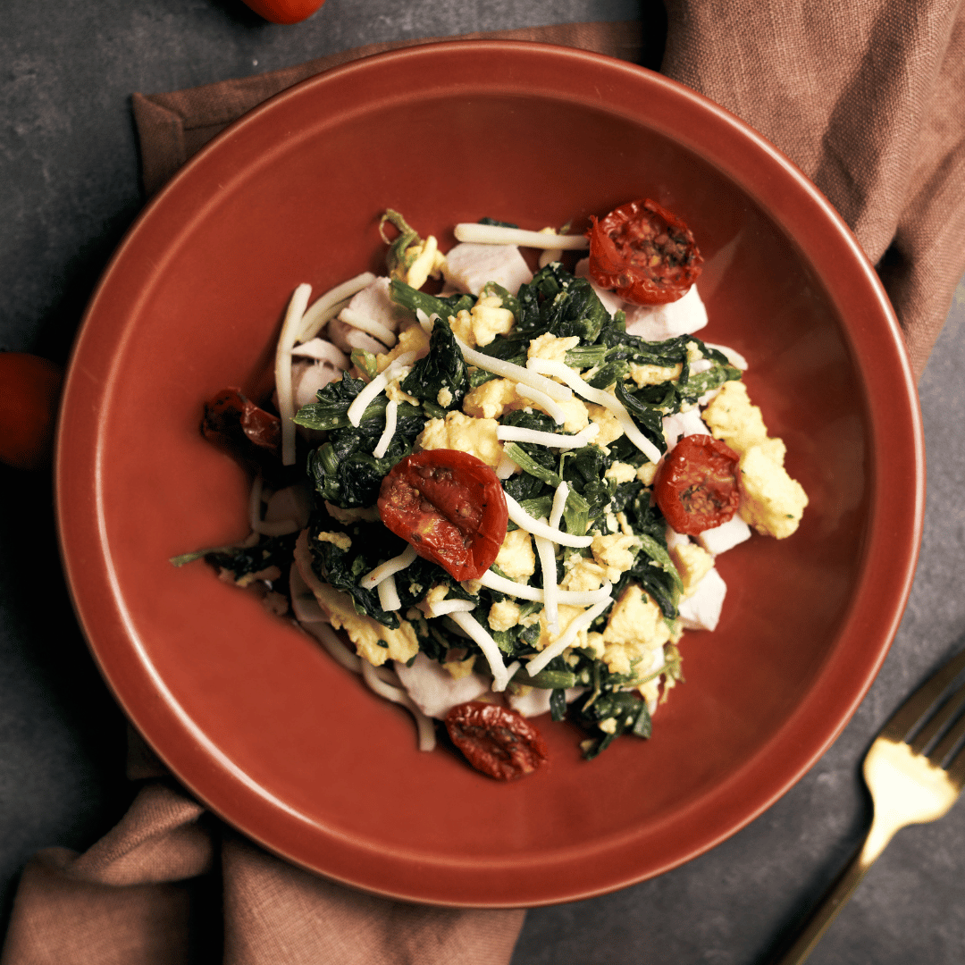 High Protein Scrambled Eggs Florentine with Lean Chicken, Creamed Spinach & Oven Dried Cherry Tomato
