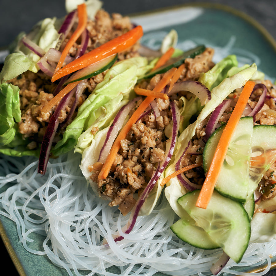 Chicken Larb Salad with Shredded Carrots, Sliced Cucumber, Larb Dressing & Glass Vermicelli