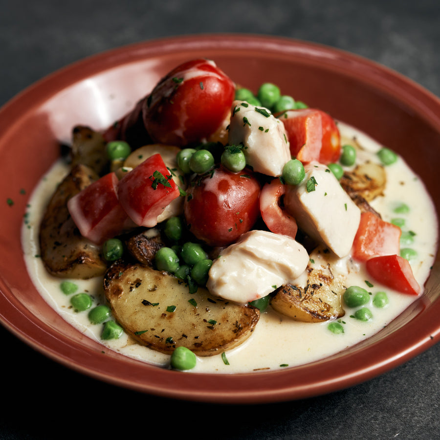 Chicken a La King with Assorted Bell Peppers, Green Peas, Cherry Tomatoes & Roasted Potatoes