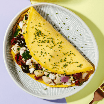 Greek Omelette with Chicken, Tomatoes, Kalamata Olives, Zucchini, Red Peppers, Onion & Feta