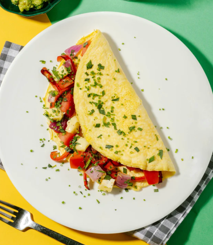 Plant-Based Chicken and Cheese Omelette with Roasted Peppers, Tomato, Red Onion & Tarragon