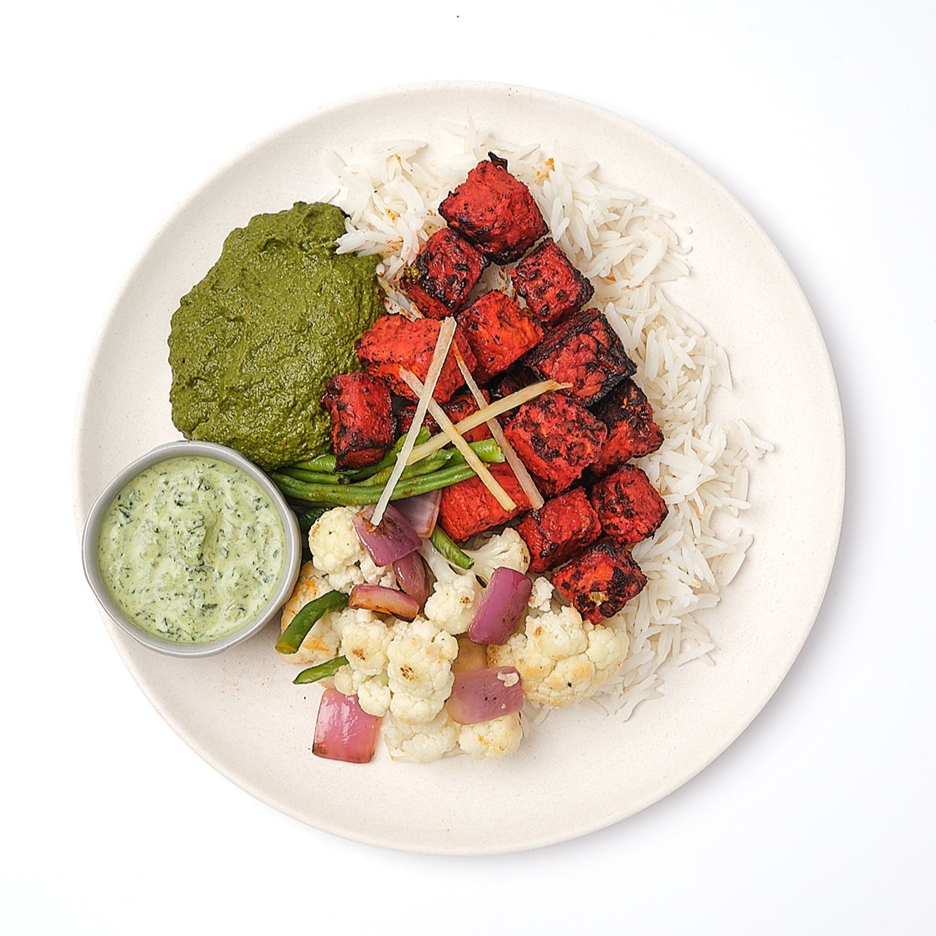 Tandoori Tempeh with Cauliflower, Green Beans, Roasted Onions, Palak, Mint Yoghurt & Steamed Basmati Rice